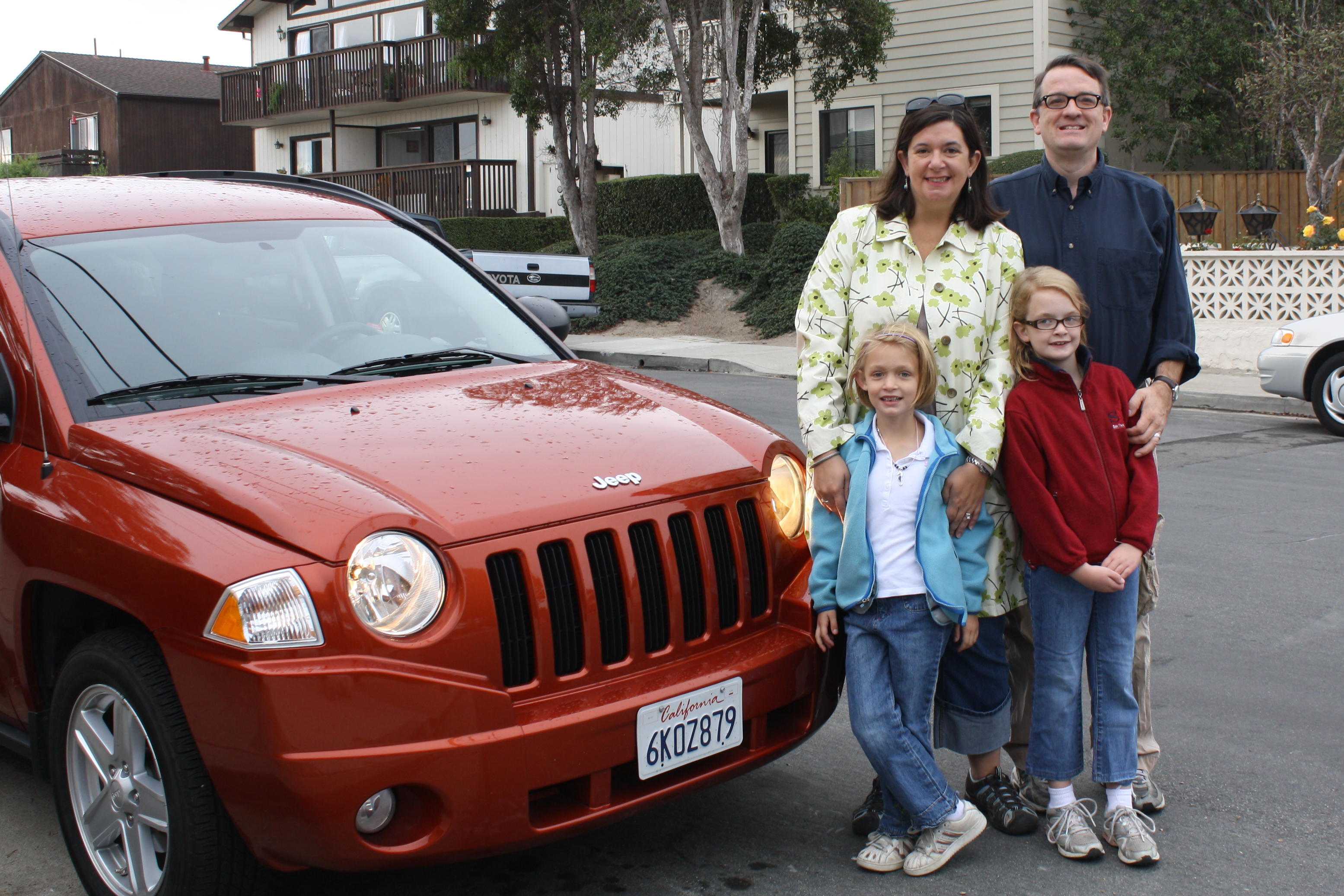 The Curti with their Jeep Compass